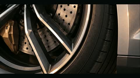 Machined spokes and drilled brake rotor
